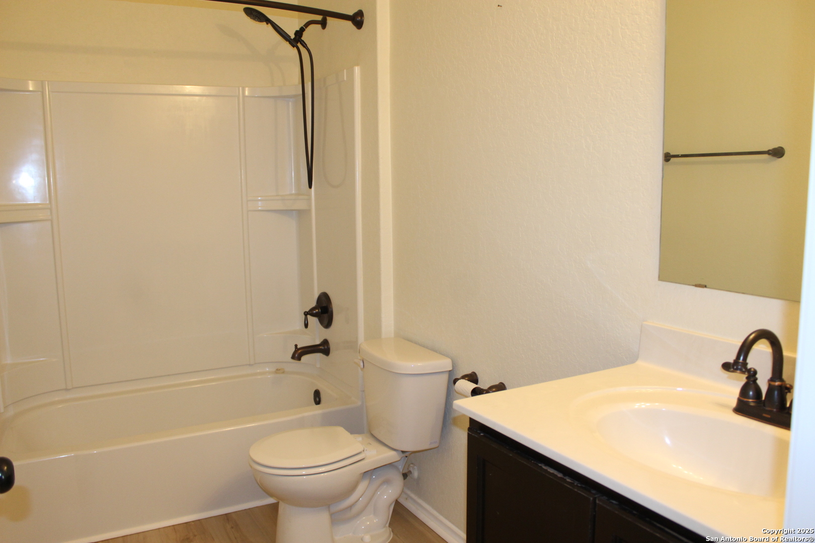 482 Walnut Crest Selma, TX 78154 - Photo 12 of 19 a bathroom with a sink a toilet and shower