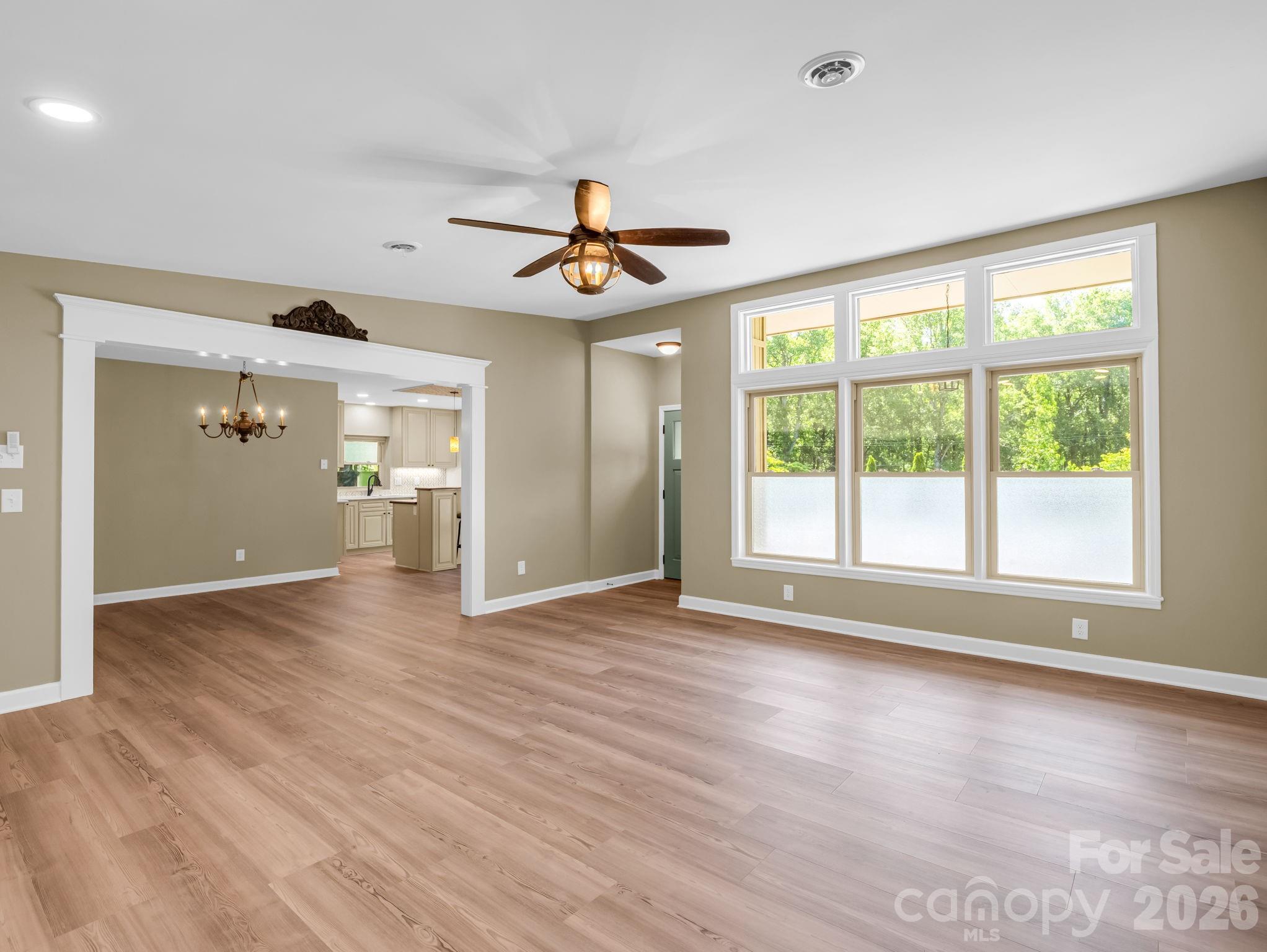 44 Jervey Road, Unit 4C Tryon, NC 28782 - Photo 5 of 35 a view of an empty room with wooden floor and a window