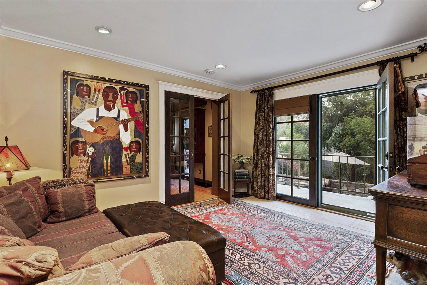 267 Fairview Road Ojai, CA 93023 - Photo 11 of 50 a bedroom with a bed and glass door