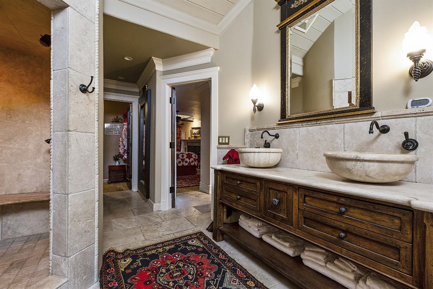 267 Fairview Road Ojai, CA 93023 - Photo 45 of 50 a bathroom with a sink and a mirror