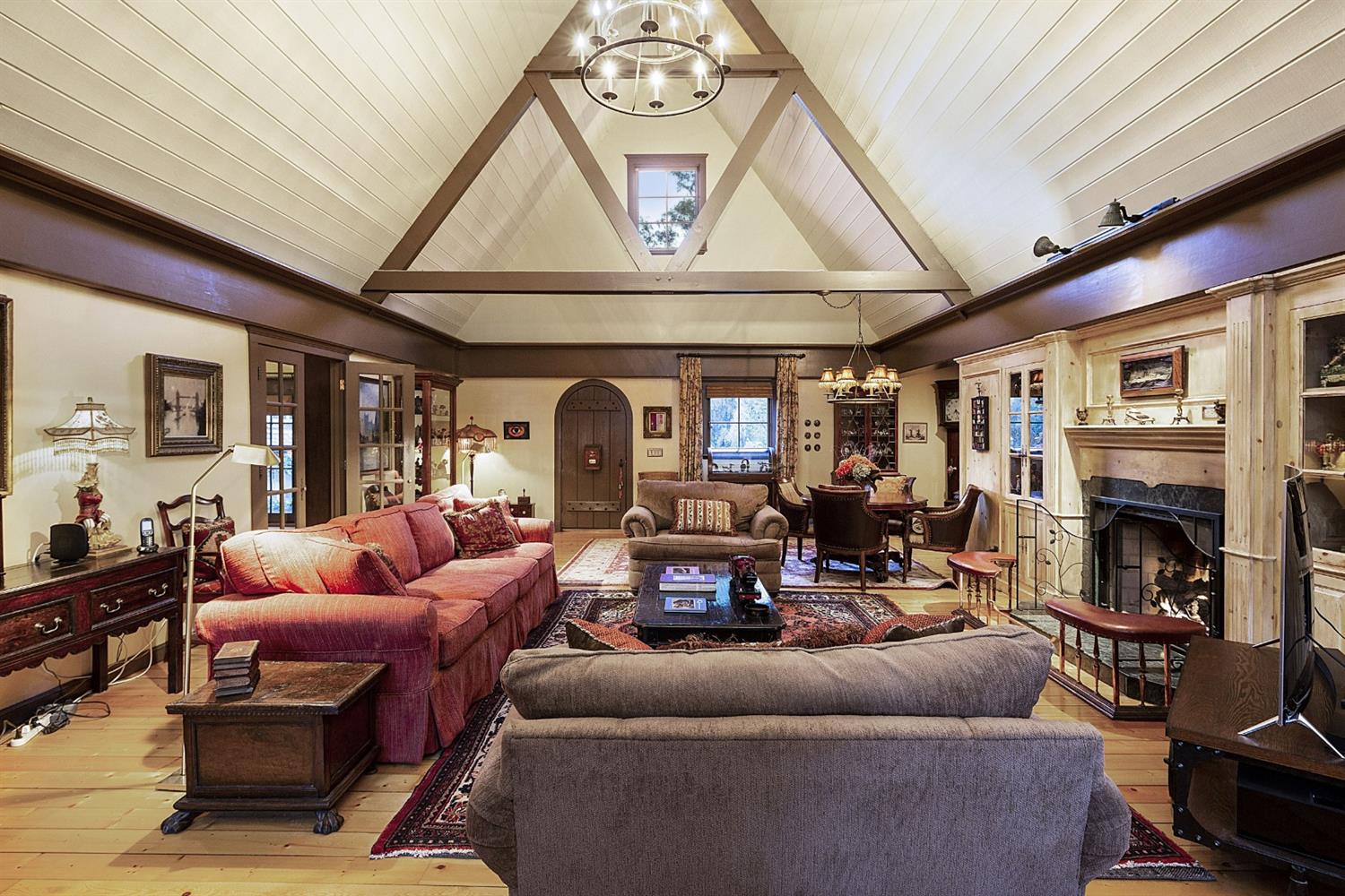 267 Fairview Road Ojai, CA 93023 - Photo 6 of 50 a living room with furniture a fireplace and a large window