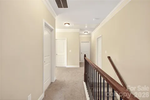 a view of hallway with stairs