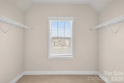 a view of a room that has a window in it