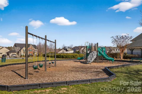 a view of a park with swings