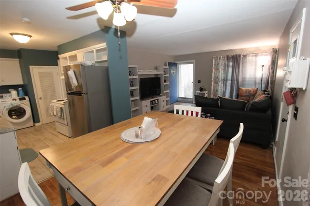 a kitchen with a sink a stove and cabinets
