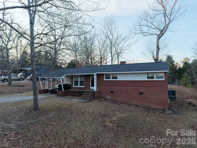 a view of a yard with trees