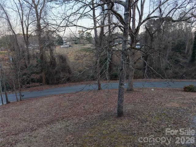 an aerial view of residential house with outdoor space