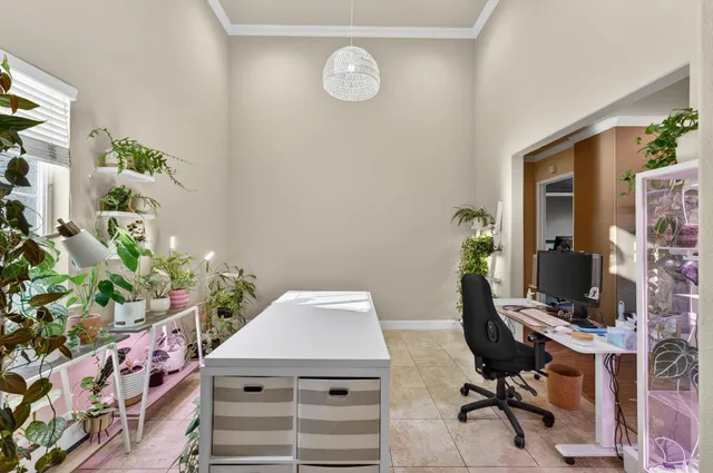 a view of a workspace with furniture