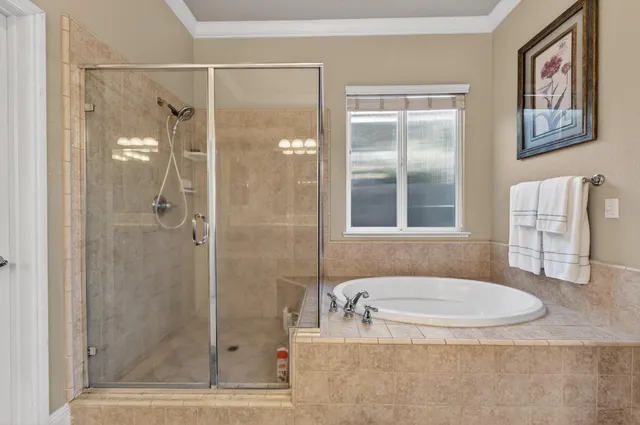 a bathroom with a double vanity sink mirror and toilet