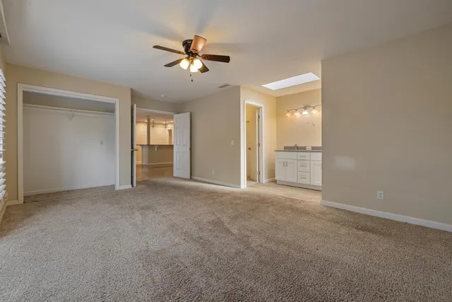 a bathroom with a double vanity sink and mirror