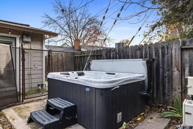 a bathroom with a bathtub and shower
