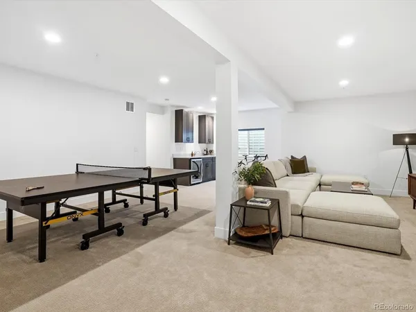 a living room with furniture and a couch