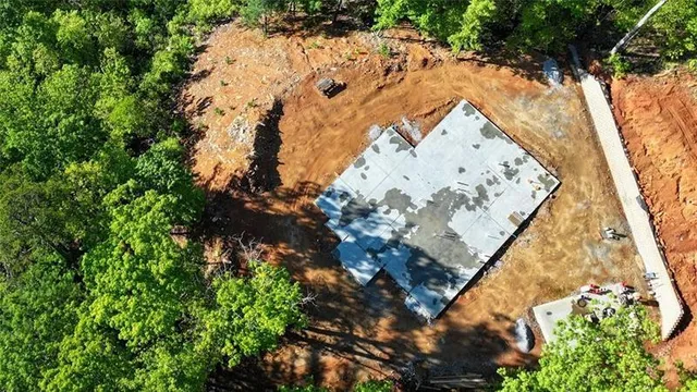an aerial view of house with yard