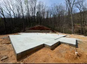 a view of a backyard of a house
