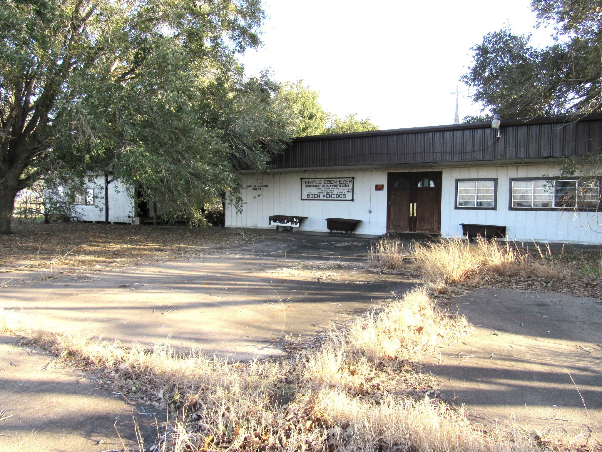 1103 Highway 59 Edna, TX 77957 - Photo 16 of 26 a view of a house with a swimming pool