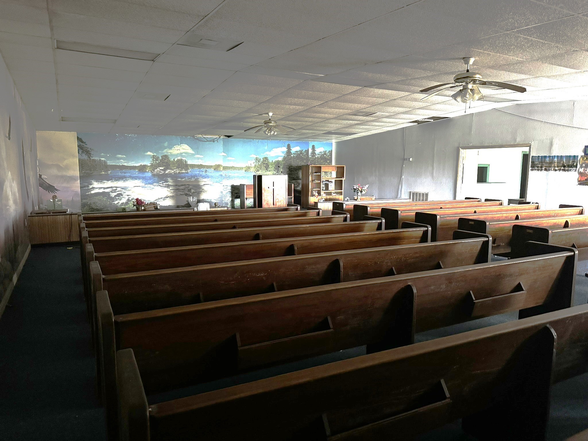 1103 Highway 59 Edna, TX 77957 - Photo 5 of 26 a living room with lots of furniture and a chandelier