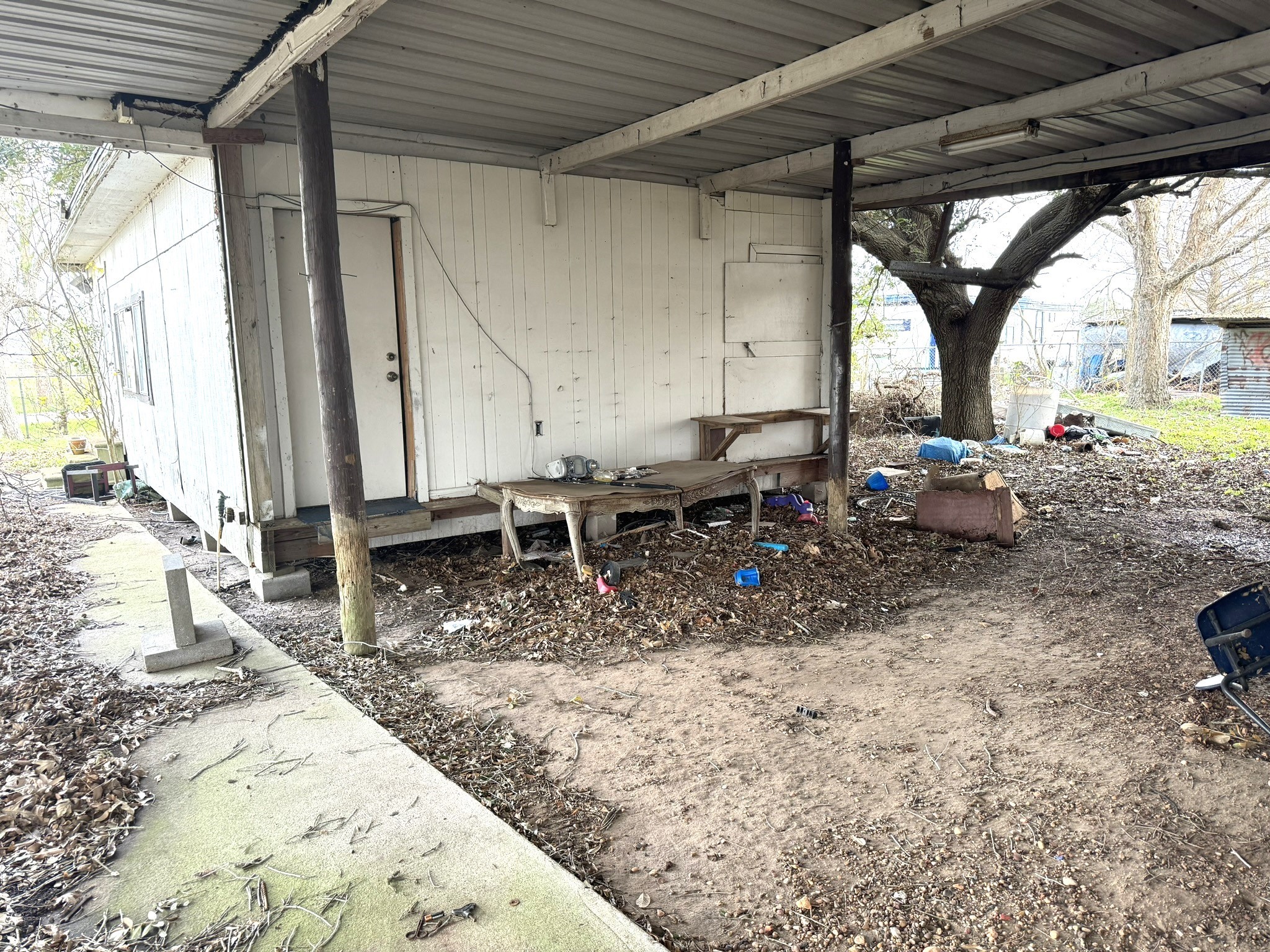 1103 Highway 59 Edna, TX 77957 - Photo 10 of 26 a view of a lounge chair in the backyard