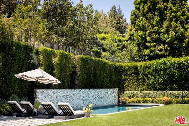 a view of a table and chairs in the patio