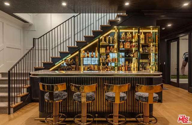 a view of entryway with stairs and wooden floor