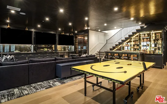 a kitchen with a table and chairs