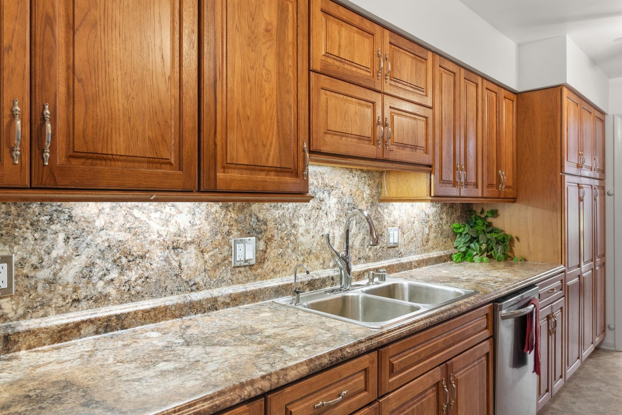 3210 Arrowhead Road Harrisonburg, VA 22801 - Photo 11 of 44 a kitchen with granite countertop stainless steel appliances a sink window and cabinets