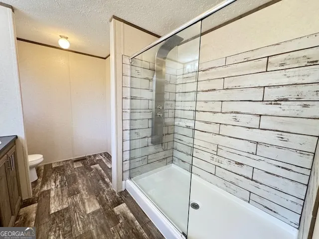 a bathroom with a bathtub and a toilet