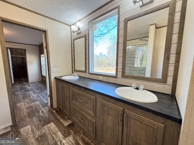 a view of front door with wooden floor