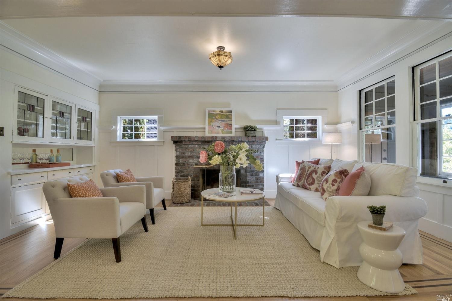271 Crescent Road San Anselmo, CA 94960 - Photo 1 of 1 a living room with furniture and wooden floor