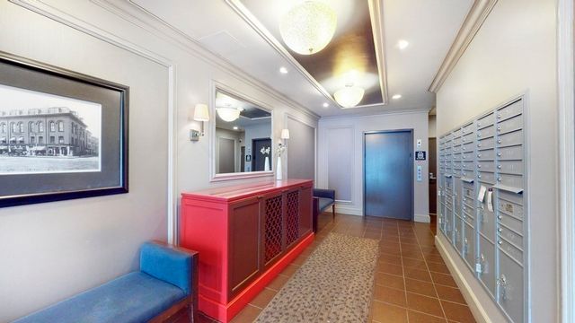 a view of hallway with windows