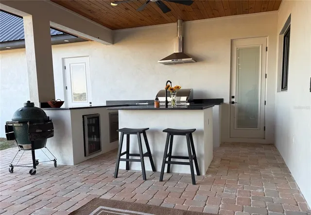 a kitchen with a stove and a microwave