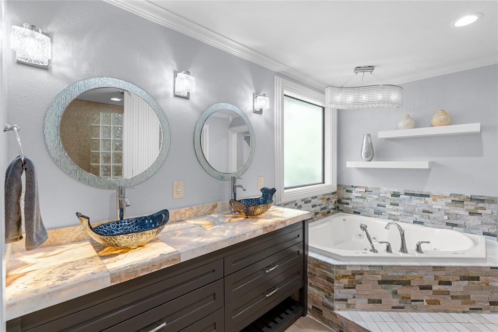 692 Private Road 5937 Emory, TX 75440 - Photo 21 of 40 a bathroom with a sink double vanity and a mirror