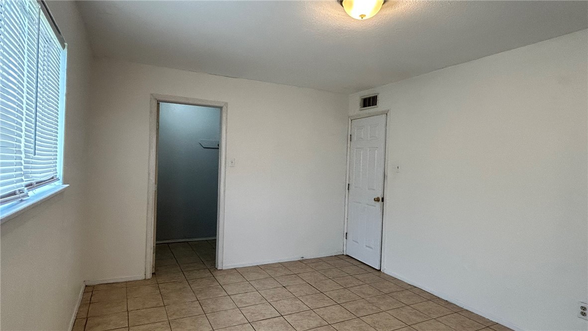1004 Austin Street, Unit 9 Portland, TX 78374 - Photo 15 of 22 Primary bedroom reverse angle