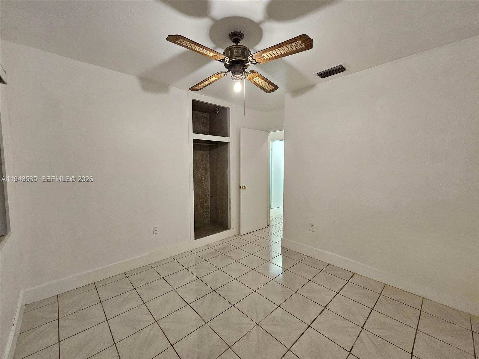 9940 Southwest 162nd Street Miami, FL 33157 - Photo 7 of 21 a view of an empty room