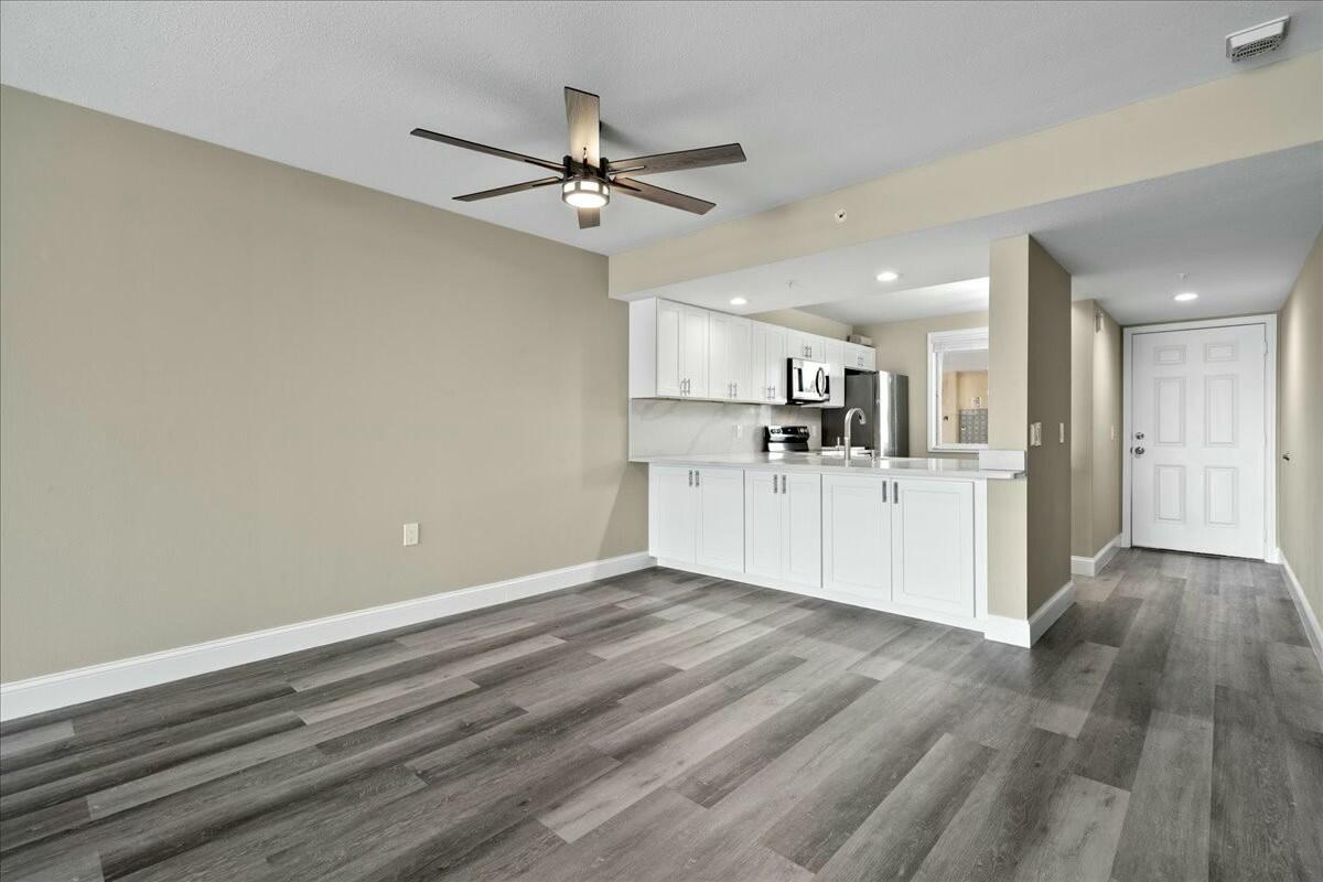 2601 Marina Isle Way, Unit 103 Jupiter, FL 33477 - Photo 11 of 56 a view of a kitchen with electric appliances