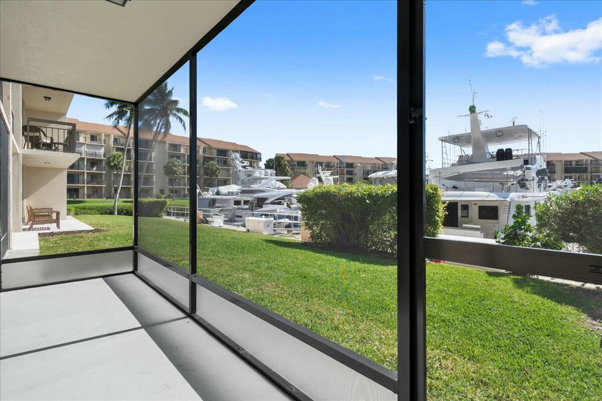 2601 Marina Isle Way, Unit 103 Jupiter, FL 33477 - Photo 16 of 56 a view of a city from a window