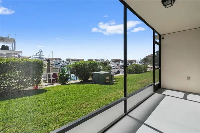 a bedroom with a large bed and a large window