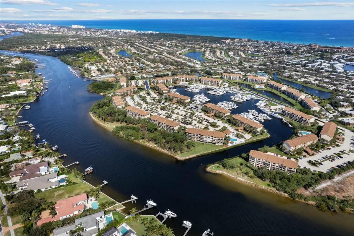 2601 Marina Isle Way, Unit 103 Jupiter, FL 33477 - Photo 47 of 56 an aerial view of residential houses with outdoor space