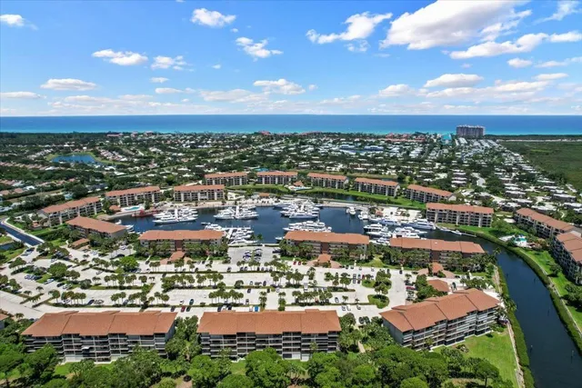 a view of a building with a yard