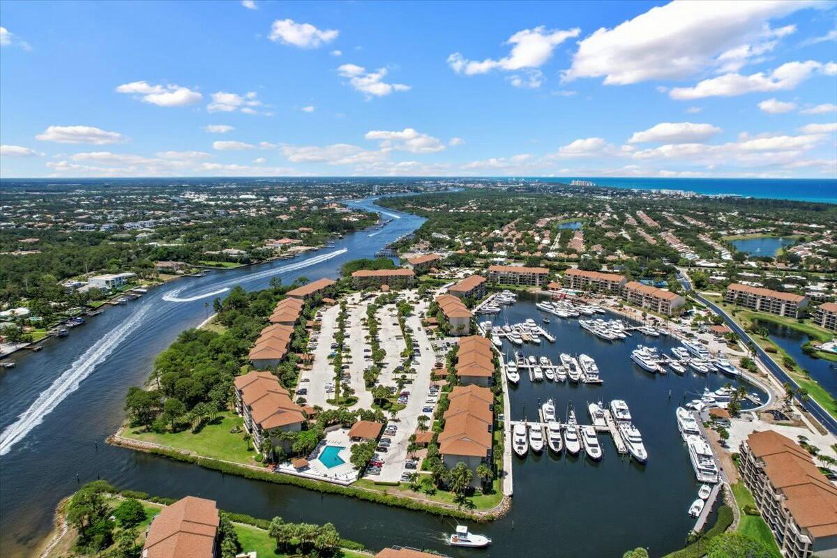 2601 Marina Isle Way, Unit 103 Jupiter, FL 33477 - Photo 52 of 56 an aerial view of city and lake