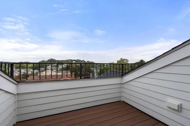 a view of a balcony with city view
