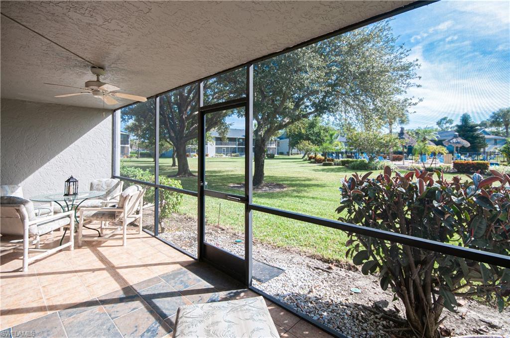 1208 Commonwealth Circle, Unit J103 Naples, FL 34116 - Photo 23 of 31 a view of balcony with furniture