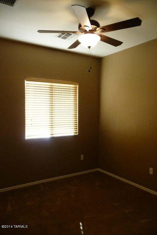21321 East Reunion Road Red Rock, AZ 85145 - Photo 28 of 34 a view of an empty room with a window