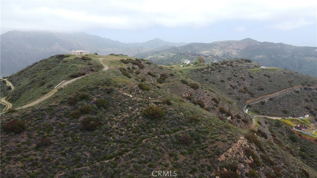 9533 Deer Creek Road Malibu, CA 90265 - Photo 25 of 29 a view of a mountain range with trees
