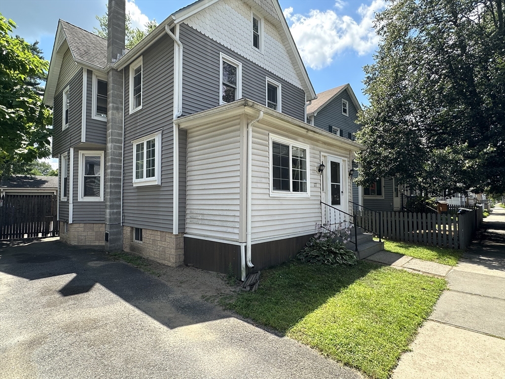 177 Johnson Street Springfield, MA 01108 - Photo 3 of 23 a view of a back yard of the house