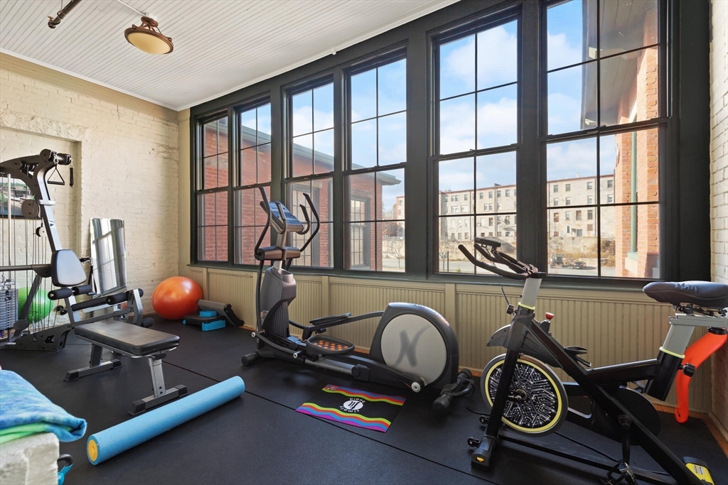 99 Allen Street, Unit 205 Woonsocket, RI 02895 - Photo 31 of 37 a room with gym equipment