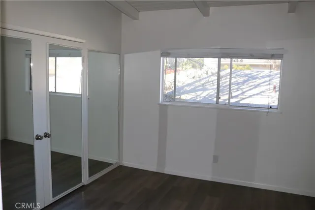 a view of a livingroom with hardwood floor