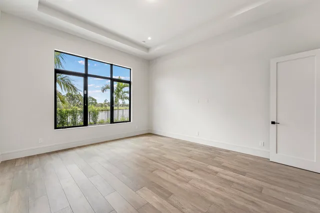 a bathroom with a double vanity sink mirror and shower