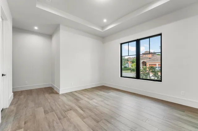a bathroom with a toilet a sink and shower