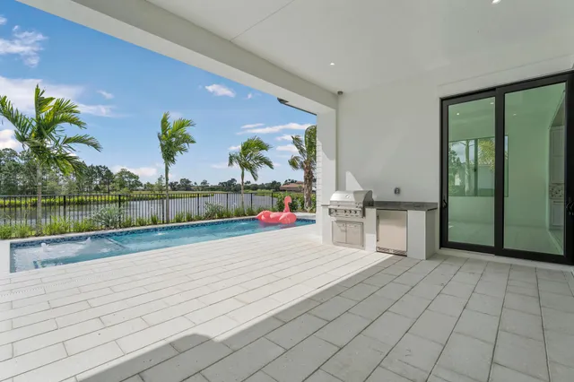 a view of a living room and entry way