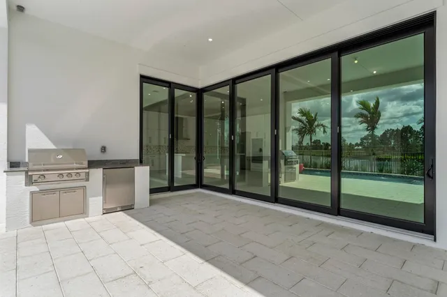 a view of a house with a swimming pool